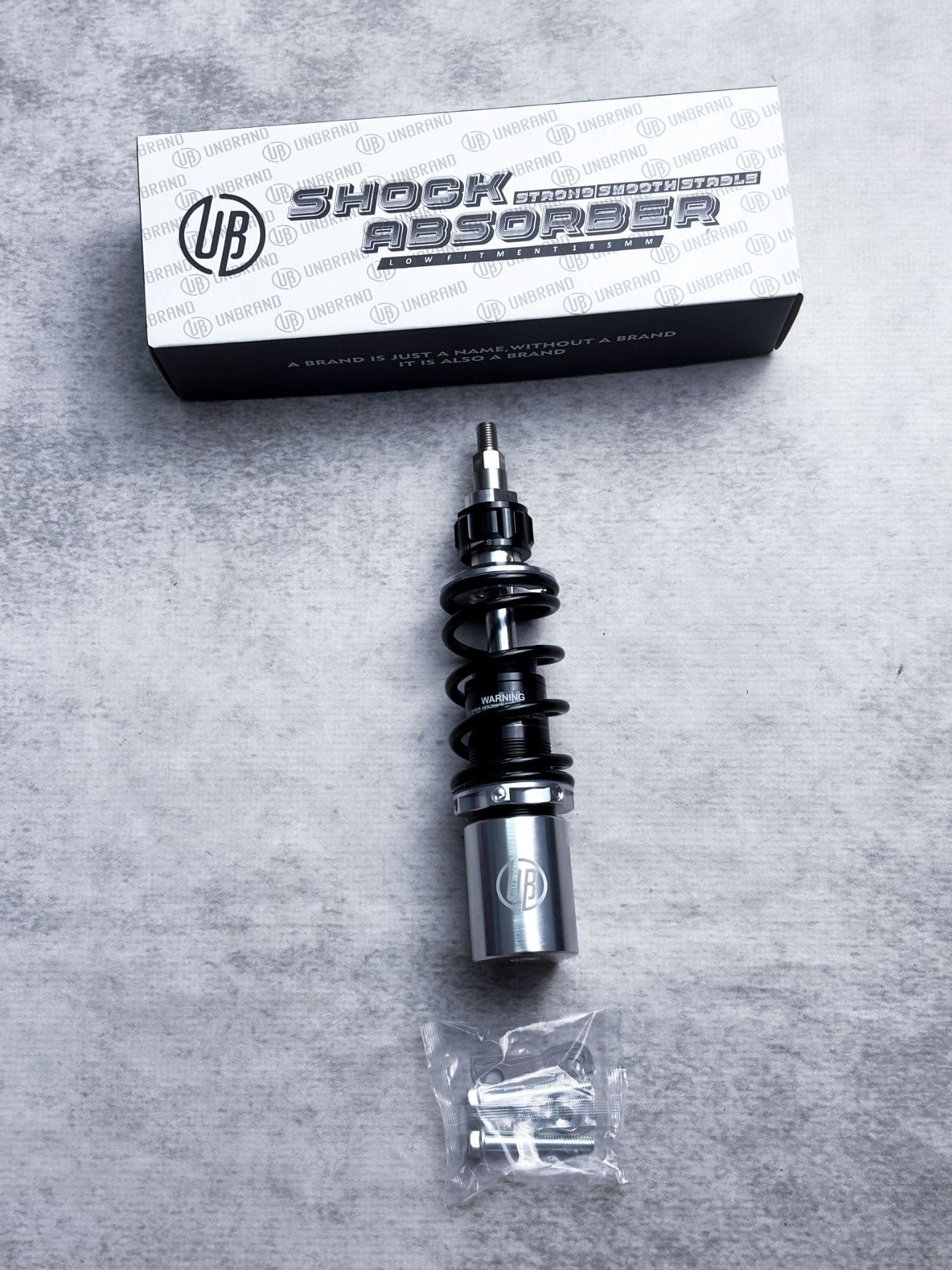 Unbrand Shock Absorber Low Fitment Silver - Image 1